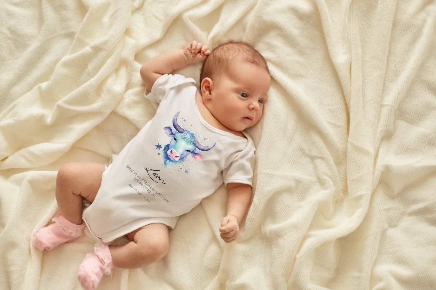 newborn-baby-girl-boy-lying-blanket-bed-looking-away-wearing-white-bodysuit-socks-infant-studying-world-around-has-sleepy-expression