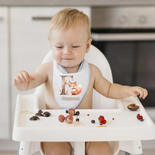 smiley-cute-baby-eating-alone