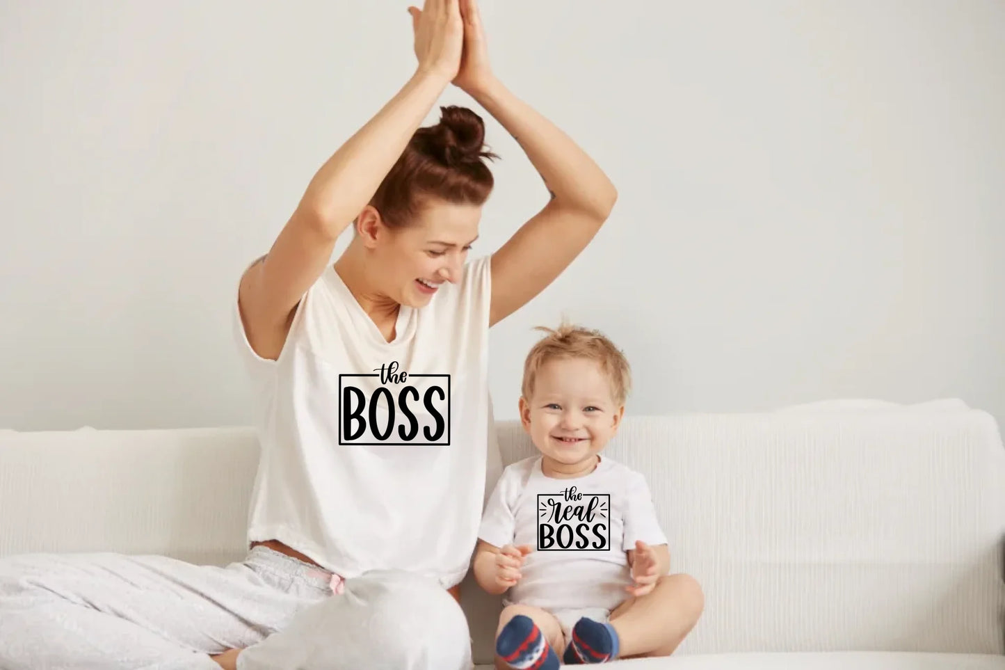 young-mother-with-her-one-years-old-little-son-dressed-pajamas-are-relaxing-playing