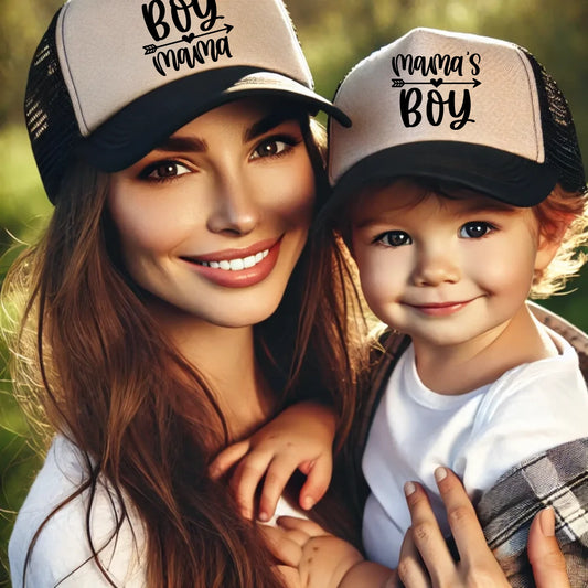 DALL·E 2025-03-21 12.27.21 - A loving mother and her child wearing matching trucker caps. The mother has a warm smile as she holds her young child in her arms. They are outdoors i