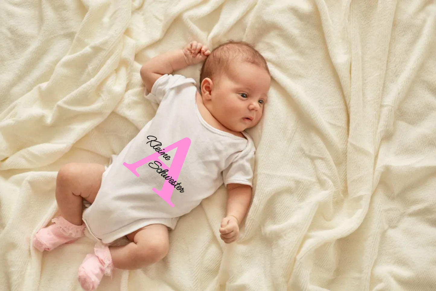 newborn-baby-girl-boy-lying-blanket-bed-looking-away-wearing-white-bodysuit-socks-infant-studying-world-around-has-sleepy-expression