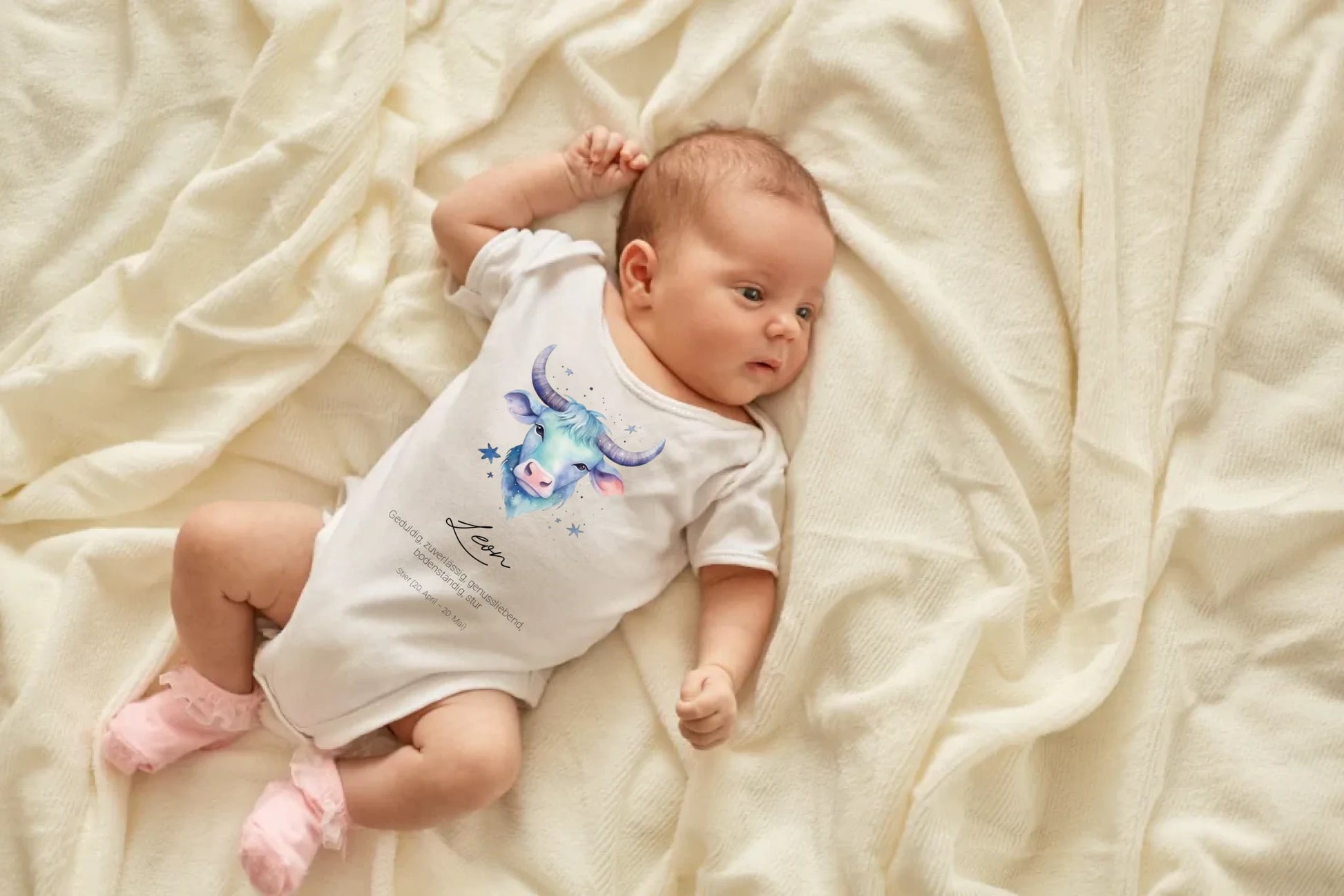 newborn-baby-girl-boy-lying-blanket-bed-looking-away-wearing-white-bodysuit-socks-infant-studying-world-around-has-sleepy-expression