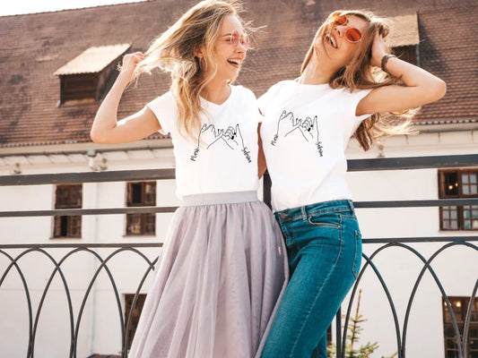 portrait-two-young-beautiful-blond-smiling-hipster-girls-trendy-summer-white-t-shirt-clothes-positive-models-having-fun-sunglasses-hugging