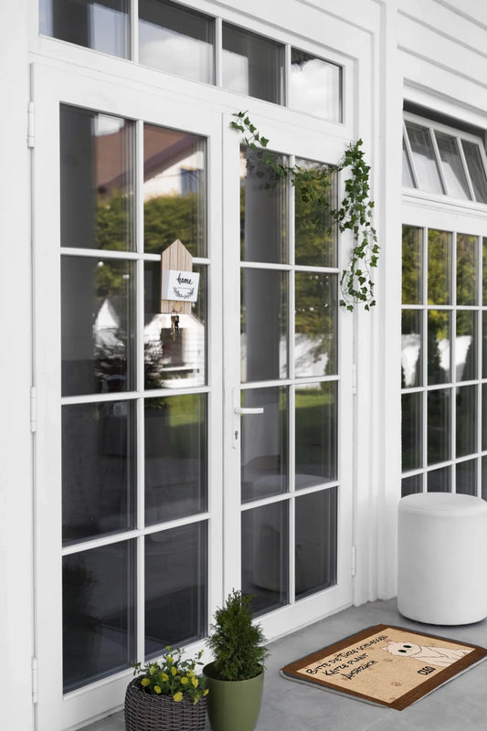 decorated-front-door-with-plant