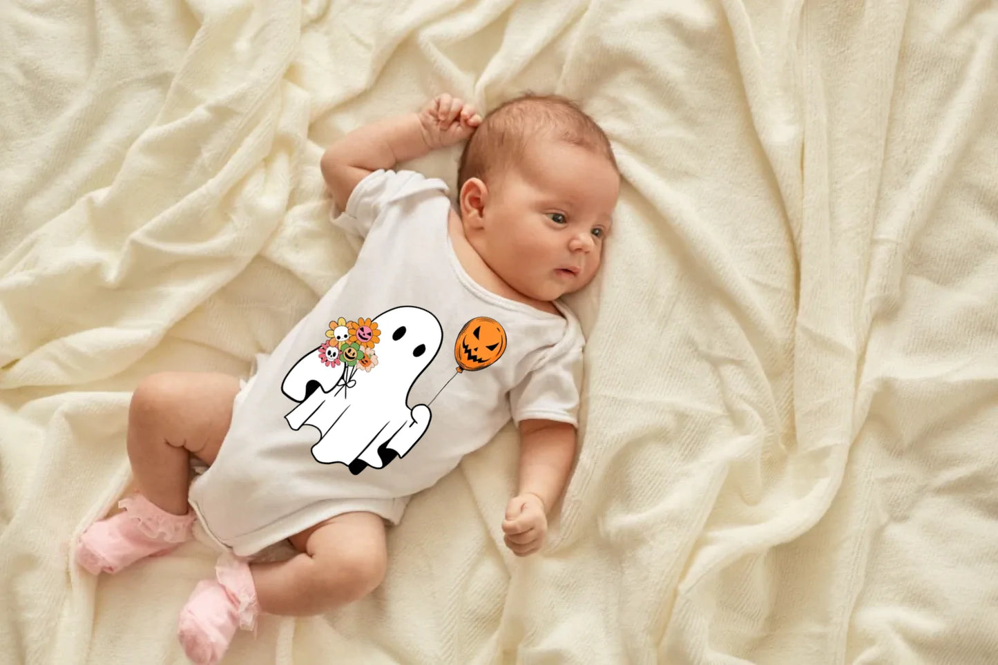 newborn-baby-girl-boy-lying-blanket-bed-looking-away-wearing-white-bodysuit-socks-infant-studying-world-around-has-sleepy-expression