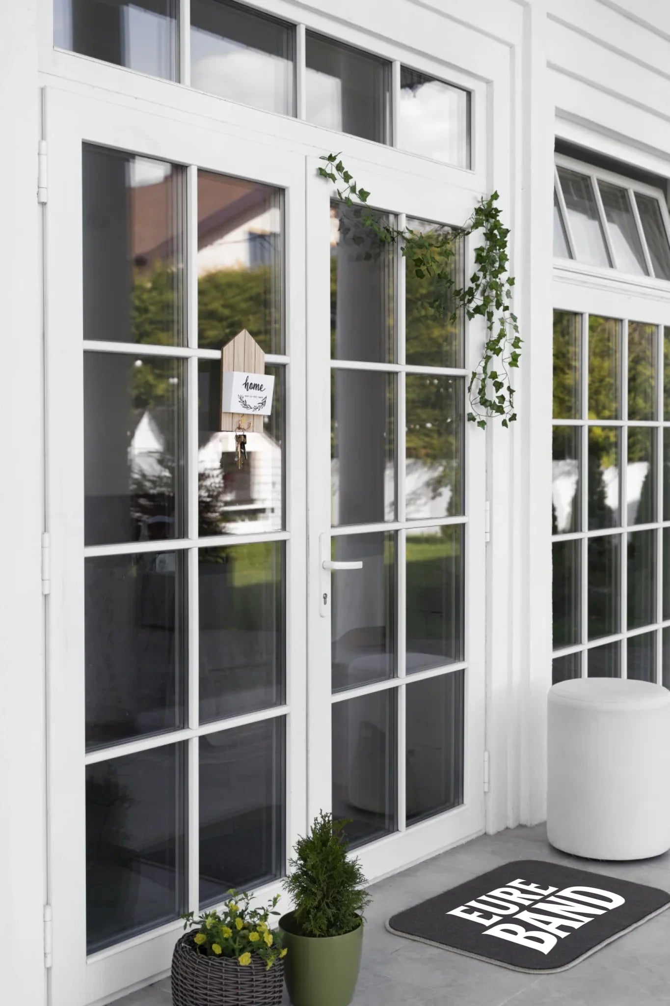 decorated-front-door-with-plant