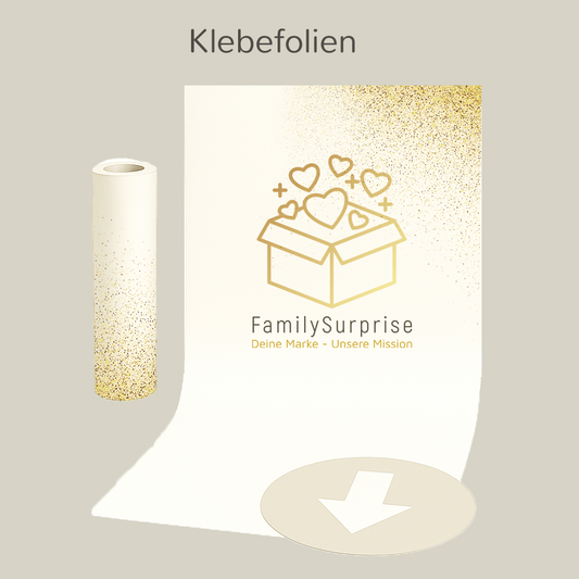 Rolle und aufgeklebte Fläche einer Klebefolie mit dem „FamilySurprise“-Logo, auf einem Bildschirm dargestellt.
