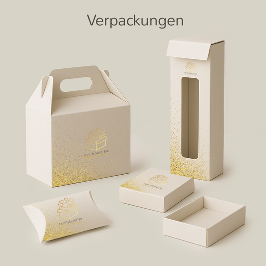 Verschiedene weiße Geschenk- und Produktverpackungen mit goldfarbenem „FamilySurprise“-Logo auf einem Bildschirm dargestellt.